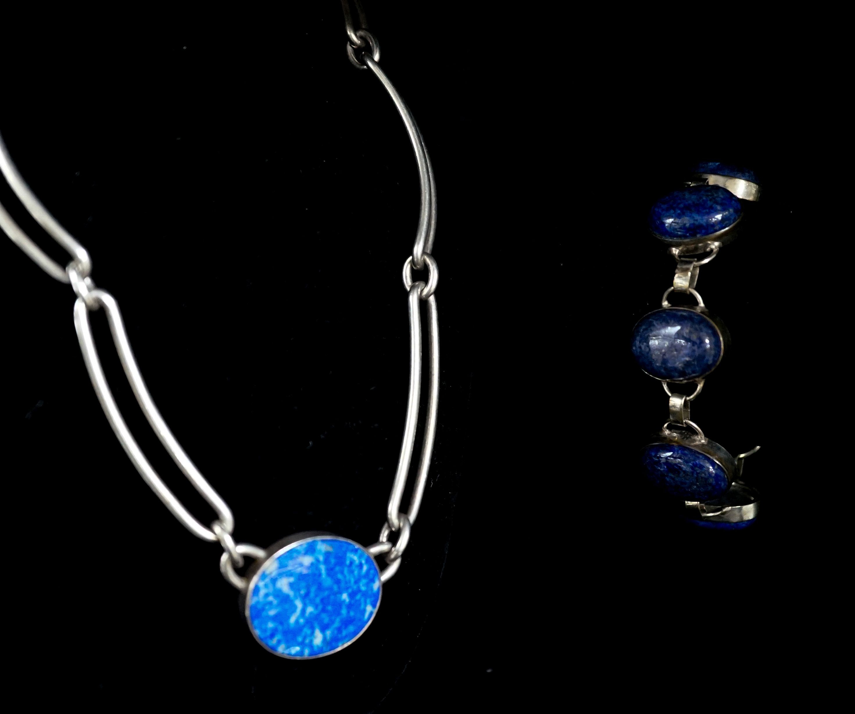 A 1980's Danish sterling 925 and lapis lazuli set necklace by N.E. From, 38cm and a white metal and lapis lazuli set bracelet.